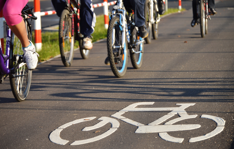 People Riding Bicycles on the Street.