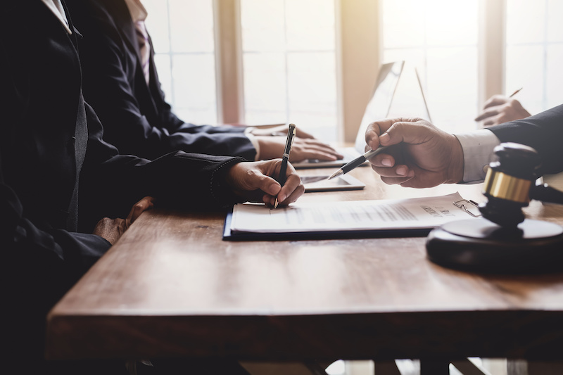 Comparative Negligence in Auto Accidents: Understanding How It Impacts Compensation 2 attorney at office